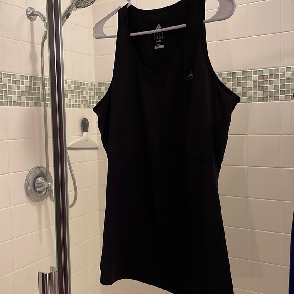 Adidas black woman’s work out tank. New without tags. XL